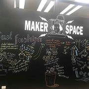 Makerspace wall with chalk illustrations