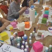 Participants make life-sized Yahtzee pieces