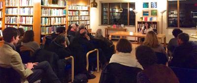 an audience at a reading at Harvard's Woodberry Poetry Room