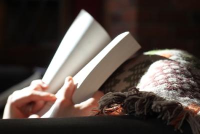 Hands holding a book