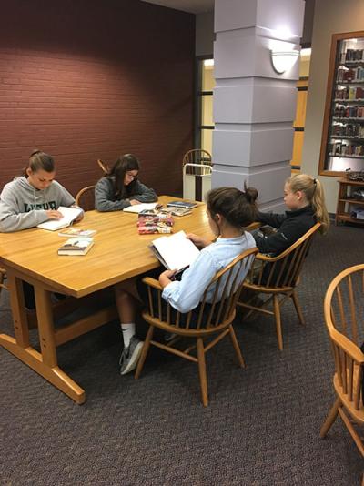 Kids participating in book speed dating