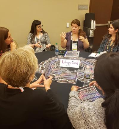 Round table of people speaking about LibraryCon program