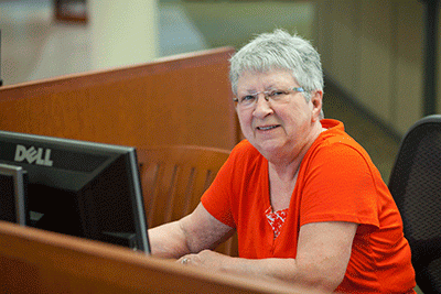 Older adult working on computer