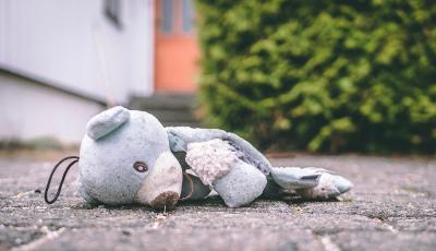 teddy bear on pavement