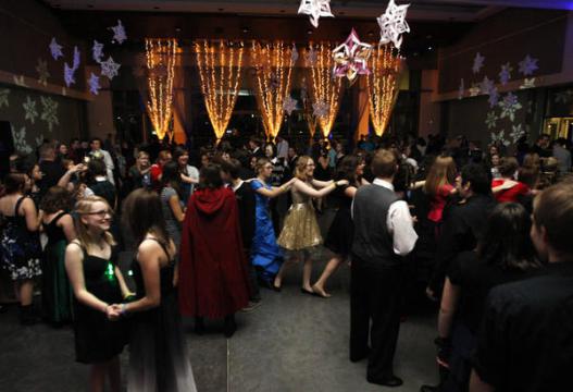 Dozens of kids dancing at the Harry Potter Yule Ball
